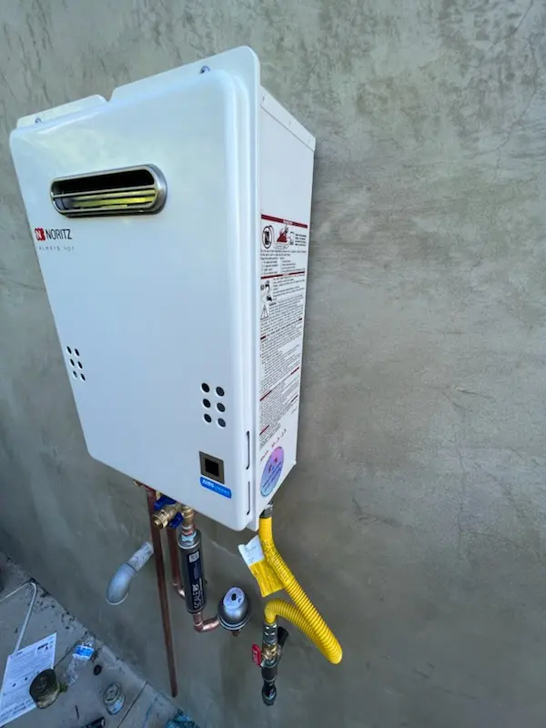 Tankless water heater installation for Woodside Estates homes
